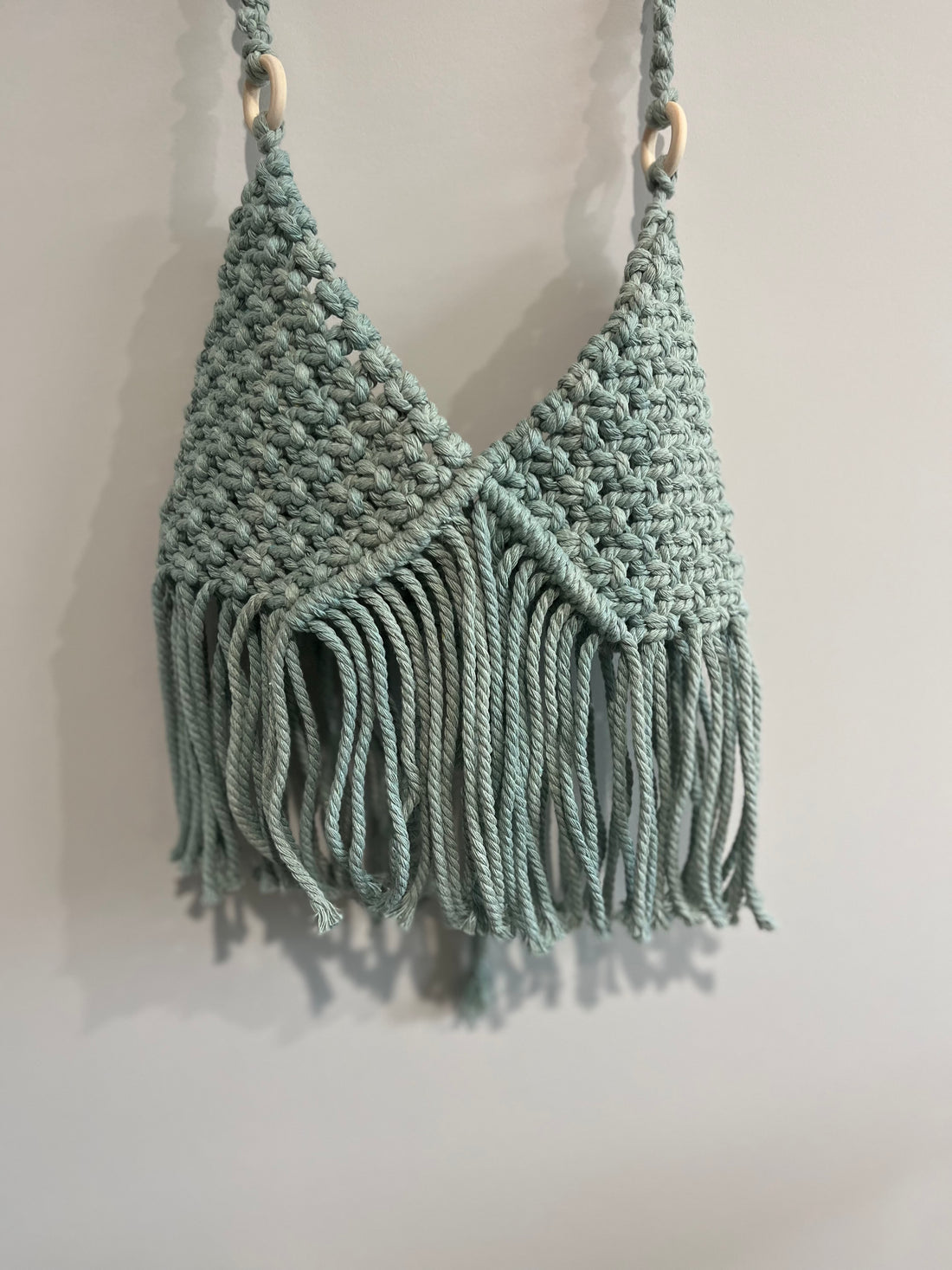 Embrace Elegance and Versatility: Introducing Our Sage Macrame Crop Top
